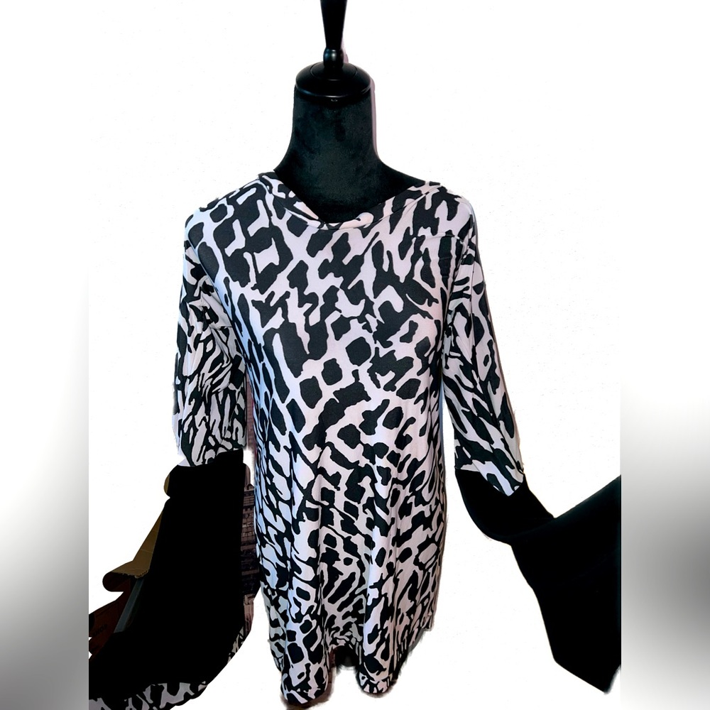 Custom made dress with flared sleeves